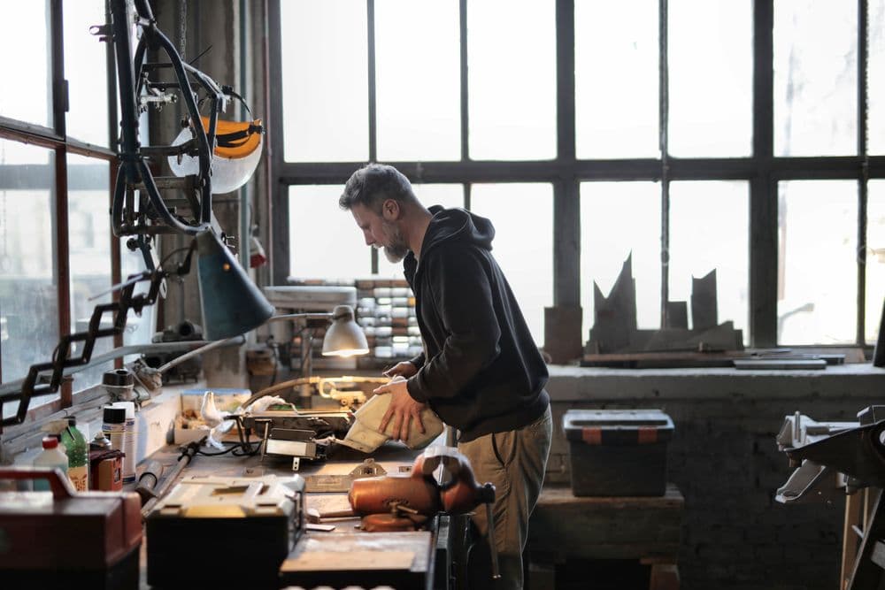 Craftsperson working at a workshop bench